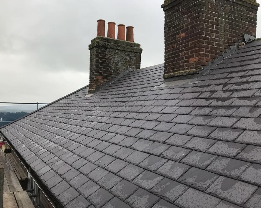 Countywide Roofing team installing a slate pitched roof in Sussex